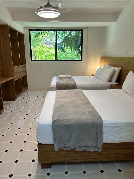 Playacar villa bedroom with garden view