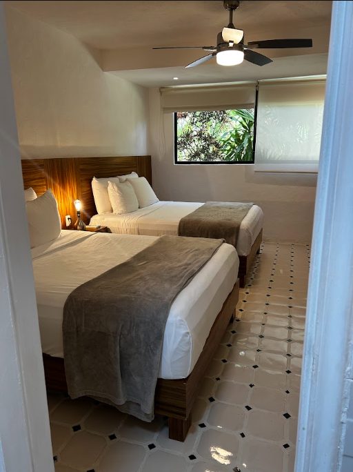 Playacar villa bedroom with twin beds
