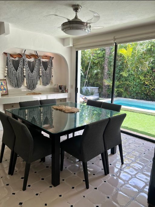 Playacar villa dining area with pool view