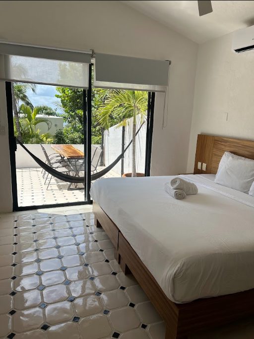 Playacar villa bedroom opening to terrace